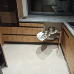 Nowoczesna kuchnia na wymiar z systemem narożnym na garnki – realizacja Dariusz Kamiński Meble na Wymiar